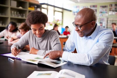 Nudging Students Toward Holistic Supports and Postsecondary Success