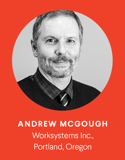 Black and white portrait of Andrew McGough, affiliated with Worksystems Inc., Portland, Oregon, on a red background.