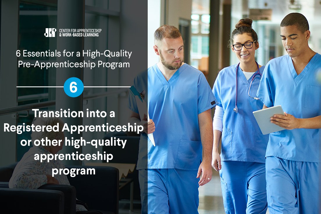 Three healthcare professionals wearing blue scrubs walk together in a hospital corridor, discussing information on a tablet. Text indicates details about a pre-apprenticeship program.
