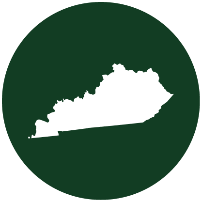 White silhouette of the state of Kentucky centered on a dark green circular background.