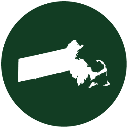 White silhouette of the state of Massachusetts centered on a dark green circular background.
