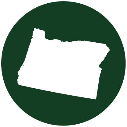 White silhouette of the state of Oregon centered on a dark green circular background.