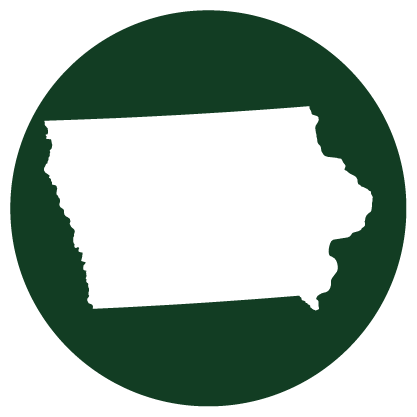 White silhouette of Iowa state on a dark green circular background.